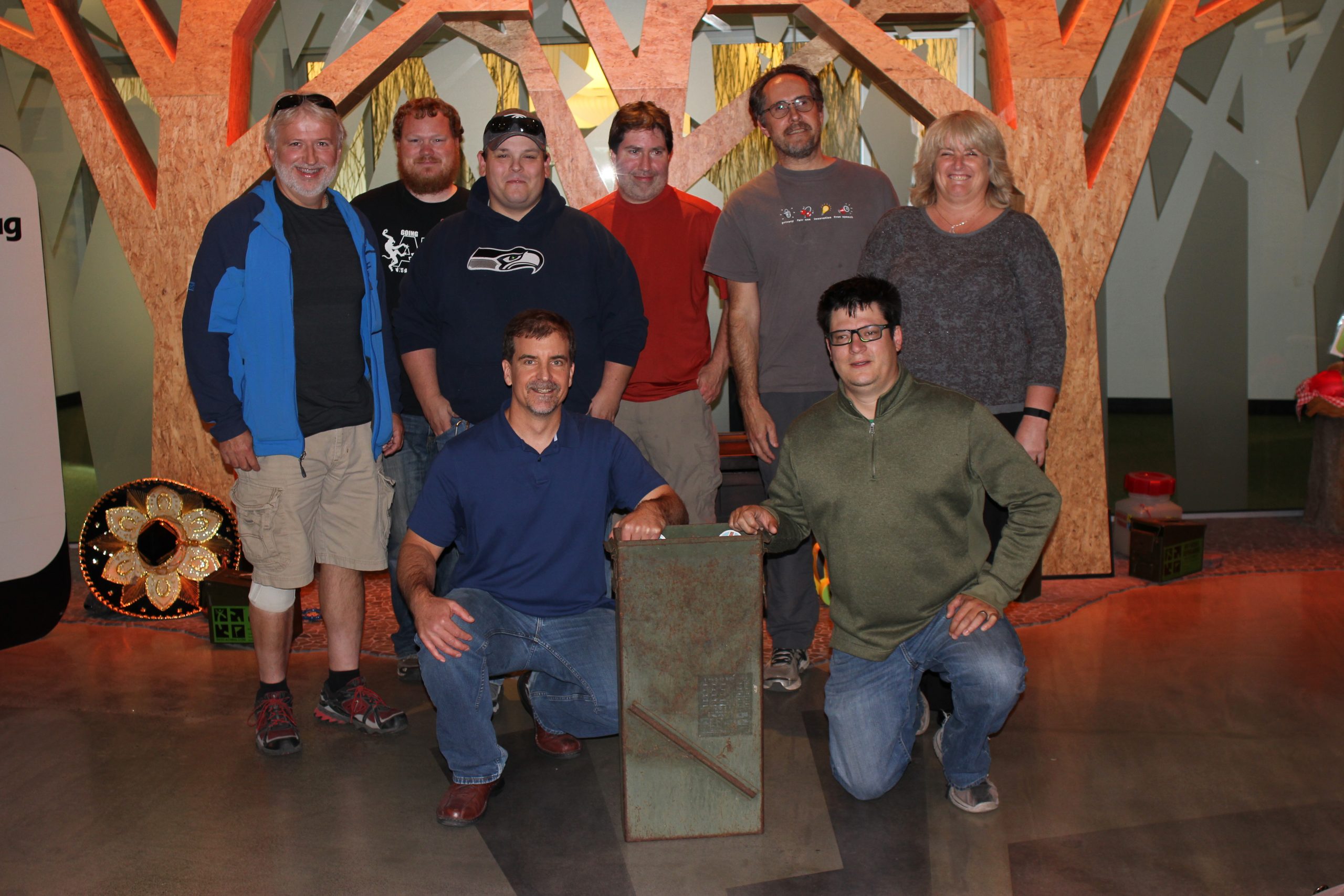 Several members of the search party at Geocaching HQ. Photo by Love.